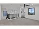 Spacious loft bedroom with ample natural light and a ceiling fan at 6216 W Molly Dr, Phoenix, AZ 85083