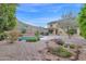 Backyard oasis with pool and landscaping at 6216 W Molly Dr, Phoenix, AZ 85083