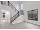 Modern staircase with black metal railings at 6216 W Molly Dr, Phoenix, AZ 85083