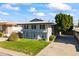 Two-story building with a landscaped yard and parking area at 6547 N 3Rd Ave, Phoenix, AZ 85013