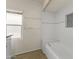Bathroom with white subway tile and built-in bench at 6547 N 3Rd Ave, Phoenix, AZ 85013