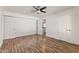 Spacious bedroom with wood-look floors and ceiling fan at 6547 N 3Rd Ave, Phoenix, AZ 85013