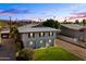 Two story house with gray exterior, landscaping, and driveway at 6547 N 3Rd Ave, Phoenix, AZ 85013