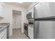 Modern kitchen with granite counters and stainless steel appliances at 6547 N 3Rd Ave, Phoenix, AZ 85013