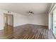 Large living room with wood-look floors and access to other rooms at 6547 N 3Rd Ave, Phoenix, AZ 85013