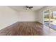 Spacious living room with wood-look floors and sliding door to balcony at 6547 N 3Rd Ave, Phoenix, AZ 85013