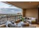 Relaxing balcony with cozy seating and scenic city views at 7181 E Camelback Rd # 904, Scottsdale, AZ 85251