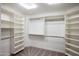Large walk-in closet with ample shelving and hanging space at 7181 E Camelback Rd # 904, Scottsdale, AZ 85251