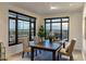 Dining room featuring multiple windows offering a scenic city view at 7181 E Camelback Rd # 904, Scottsdale, AZ 85251