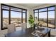 Elegant dining area with city views from large windows at 7181 E Camelback Rd # 904, Scottsdale, AZ 85251