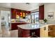 Gourmet kitchen with unique backsplash and breakfast bar at 7181 E Camelback Rd # 904, Scottsdale, AZ 85251