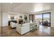Spacious living room with fireplace and access to balcony at 7181 E Camelback Rd # 904, Scottsdale, AZ 85251