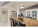 View of dining area, kitchen, and spiral staircase at 7858 E Glenrosa Ave, Scottsdale, AZ 85251