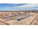 Aerial view of property with corrals and desert landscape at 8050 S Bianco Rd, Casa Grande, AZ 85193