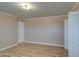 Spacious bedroom with wood-look floors and neutral walls at 8050 S Bianco Rd, Casa Grande, AZ 85193