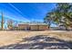 Rear view of house with a patio and yard at 8050 S Bianco Rd, Casa Grande, AZ 85193