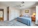 Comfortable guest bedroom with a queen-size bed and window at 8637 E Golden Cholla Cir, Gold Canyon, AZ 85118