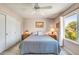 Bright bedroom featuring a large bed and ample closet space at 8637 E Golden Cholla Cir, Gold Canyon, AZ 85118