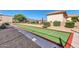 Community bocce ball court with benches and landscaping at 8637 E Golden Cholla Cir, Gold Canyon, AZ 85118