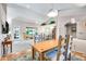 Bright dining area with wood table and chairs, view to living room at 8637 E Golden Cholla Cir, Gold Canyon, AZ 85118