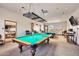 Community game room with two billiard tables and seating area at 8637 E Golden Cholla Cir, Gold Canyon, AZ 85118
