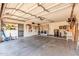 Two-car garage with washer, dryer, and additional storage at 8637 E Golden Cholla Cir, Gold Canyon, AZ 85118