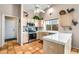 Kitchen boasts stainless steel appliances and light wood cabinets at 8637 E Golden Cholla Cir, Gold Canyon, AZ 85118