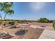 Relaxing outdoor patio with seating and desert landscaping at 8637 E Golden Cholla Cir, Gold Canyon, AZ 85118