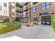 Brick building exterior with lush landscaping and a courtyard at 914 E Osborn Rd # 208, Phoenix, AZ 85014