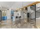 Modern kitchen with blue cabinets, island, and open floor plan at 914 E Osborn Rd # 208, Phoenix, AZ 85014