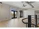 Spacious loft living area with hardwood floors and access to balcony at 914 E Osborn Rd # 208, Phoenix, AZ 85014