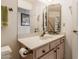 Small bathroom with vanity and toilet at 9428 W Taro Ln, Peoria, AZ 85382