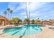 Relaxing kidney-shaped pool and spa at 9428 W Taro Ln, Peoria, AZ 85382