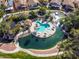 Resort-style pool with spa and a surrounding pond at 9428 W Taro Ln, Peoria, AZ 85382