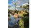 Relaxing community pool with palm trees at 9428 W Taro Ln, Peoria, AZ 85382