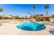 Inviting kidney-shaped pool with a spa at 9428 W Taro Ln, Peoria, AZ 85382