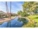 Resort-style pool and spa surrounded by lush landscaping at 9428 W Taro Ln, Peoria, AZ 85382