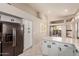 Kitchen with stainless steel appliances and white cabinets at 9428 W Taro Ln, Peoria, AZ 85382