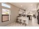 Kitchen with island and breakfast bar seating at 9428 W Taro Ln, Peoria, AZ 85382