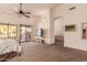 Spacious main bedroom with patio access and ensuite bathroom at 9428 W Taro Ln, Peoria, AZ 85382