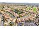 Aerial view of neighborhood with solar panels at 9428 W Taro Ln, Peoria, AZ 85382
