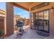 Patio with built-in grill, and view into the kitchen at 9428 W Taro Ln, Peoria, AZ 85382