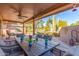 Covered patio with seating and desert views at 9428 W Taro Ln, Peoria, AZ 85382
