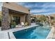 Relaxing pool area with patio furniture at 10585 E Crescent Moon Dr # 19, Scottsdale, AZ 85262