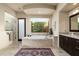 Elegant bathroom featuring a large soaking tub and walk-in shower at 10585 E Crescent Moon Dr # 19, Scottsdale, AZ 85262