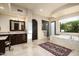 Spa-like bathroom with a soaking tub, walk-in shower, and dual sinks at 10585 E Crescent Moon Dr # 19, Scottsdale, AZ 85262