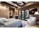 Bright bedroom with access to a private patio at 10585 E Crescent Moon Dr # 19, Scottsdale, AZ 85262