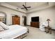 Spacious bedroom with large windows and a ceiling fan at 10585 E Crescent Moon Dr # 19, Scottsdale, AZ 85262