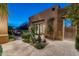 Inviting courtyard with stonework, landscaping, and outdoor seating at 10585 E Crescent Moon Dr # 19, Scottsdale, AZ 85262