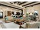 Open living room with views into kitchen and dining area, featuring comfortable seating at 10585 E Crescent Moon Dr # 19, Scottsdale, AZ 85262